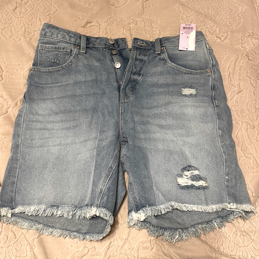 High rise fringed shorts